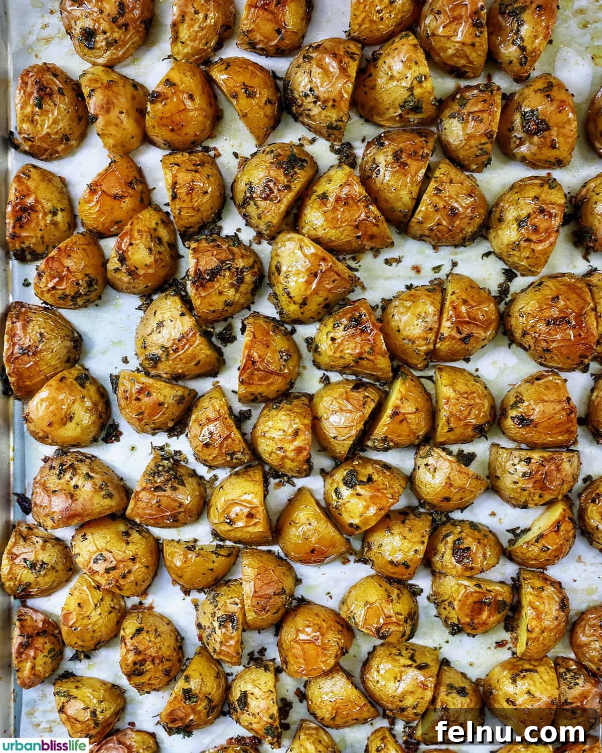 Roasted herby potatoes fresh from the oven.