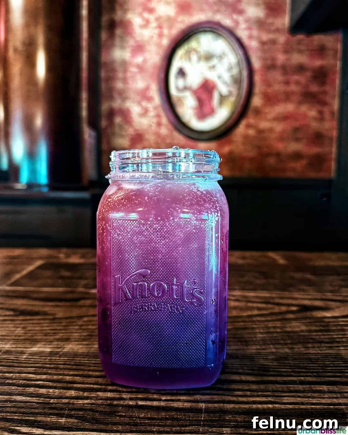 Boysenberry Bliss: A Food Lover's Journey Through Knott's Berry Farm 14 A mason jar filled with Boysenberry cream soda