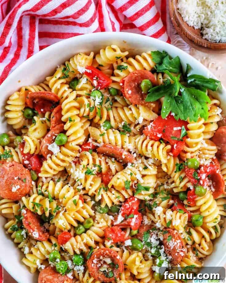 A quick and rustic pasta featuring the smoky, spicy notes of linguica sausage with sweet peas and plenty of garlic.