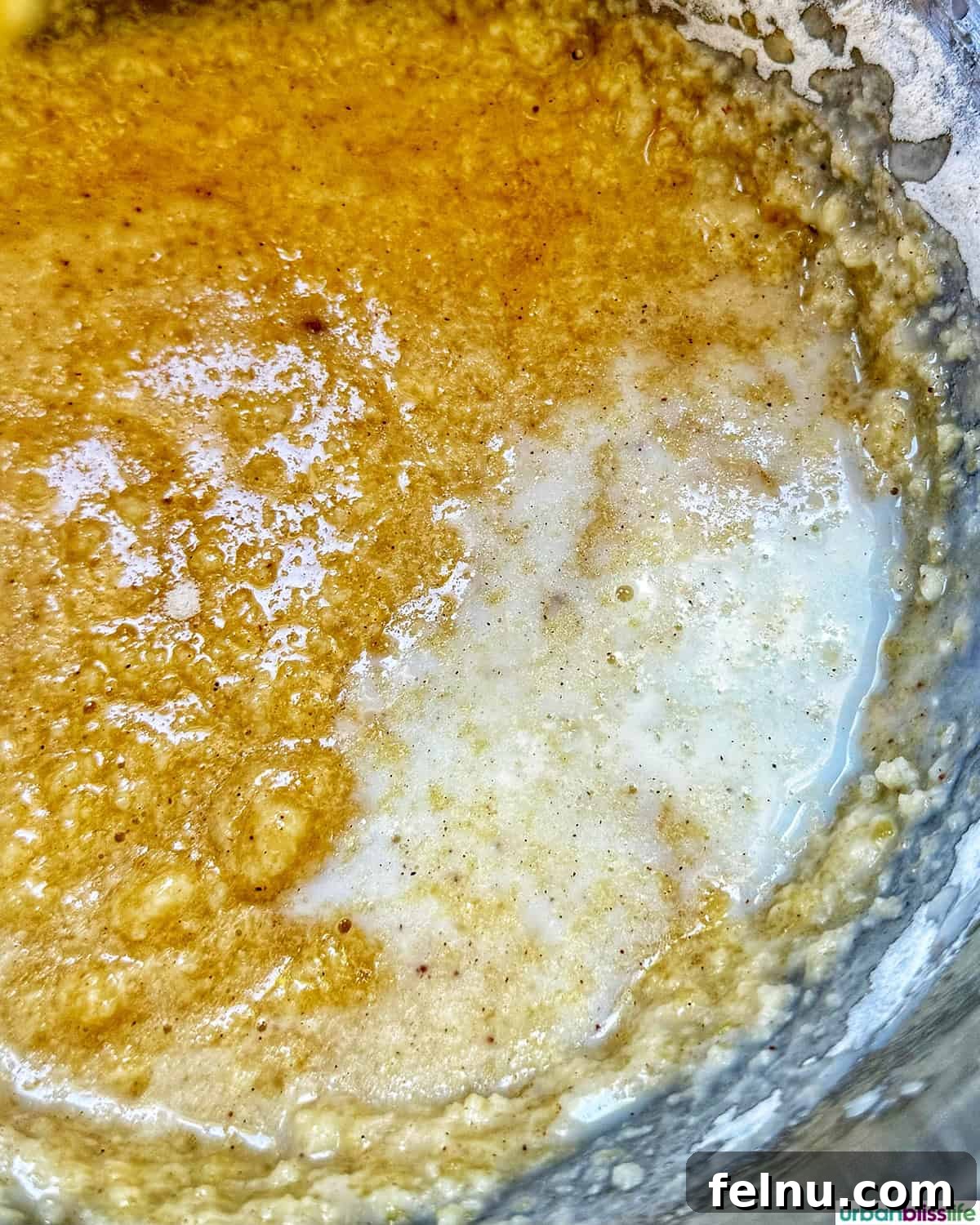Apple Cinnamon Swirl Bread 12 Wet ingredients mixed in a bowl.