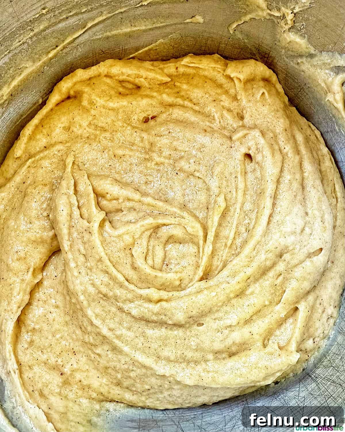 Apple Cinnamon Swirl Bread 15 Apple cinnamon loaf batter in a bowl.