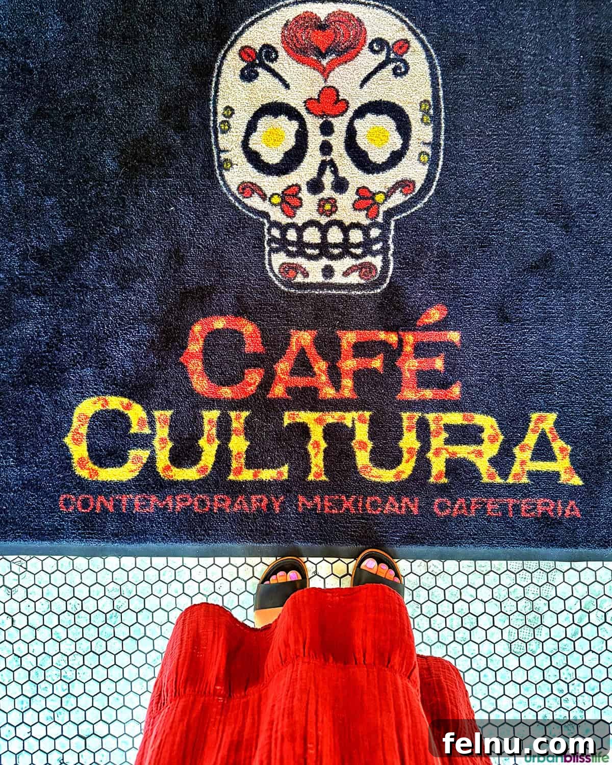 Downtown Santa Ana Eateries 18 A decorative floor mat at Cafe Cultura.