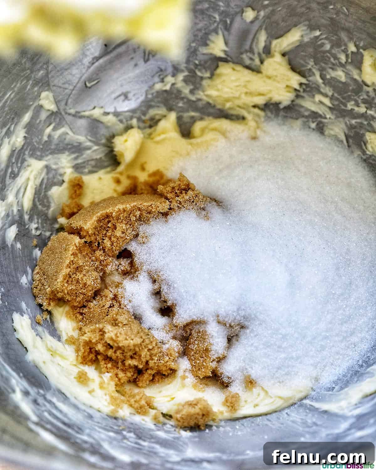 Pumpkin White Chocolate Chip Delights 7 Butter with brown sugar and granulated sugar in a bowl