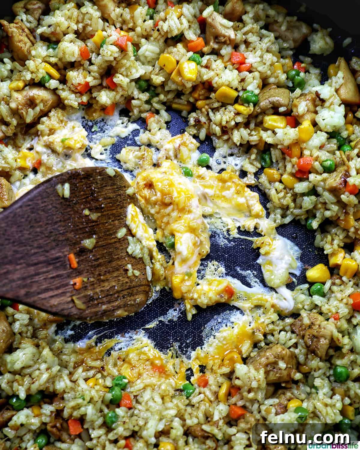 Curried Chicken Fried Rice 12 Scrambling eggs in the well.