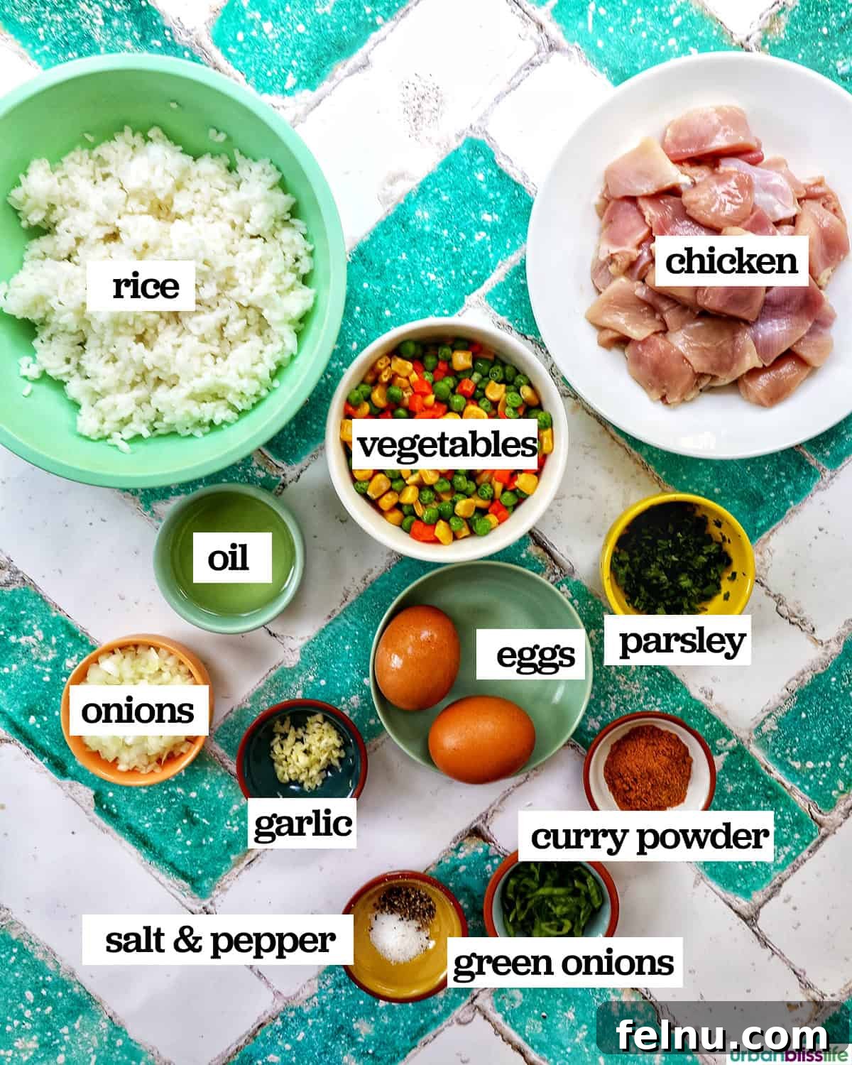 Curried Chicken Fried Rice 4 Bowls of ingredients needed to make Curry Chicken Fried Rice.