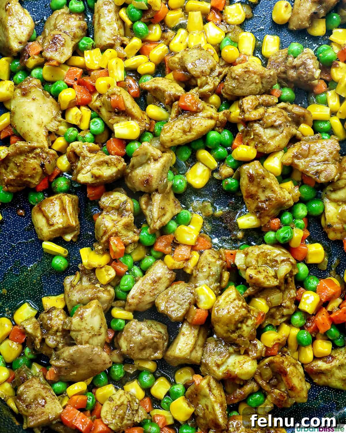Curried Chicken Fried Rice 9 Adding rice to the pan.