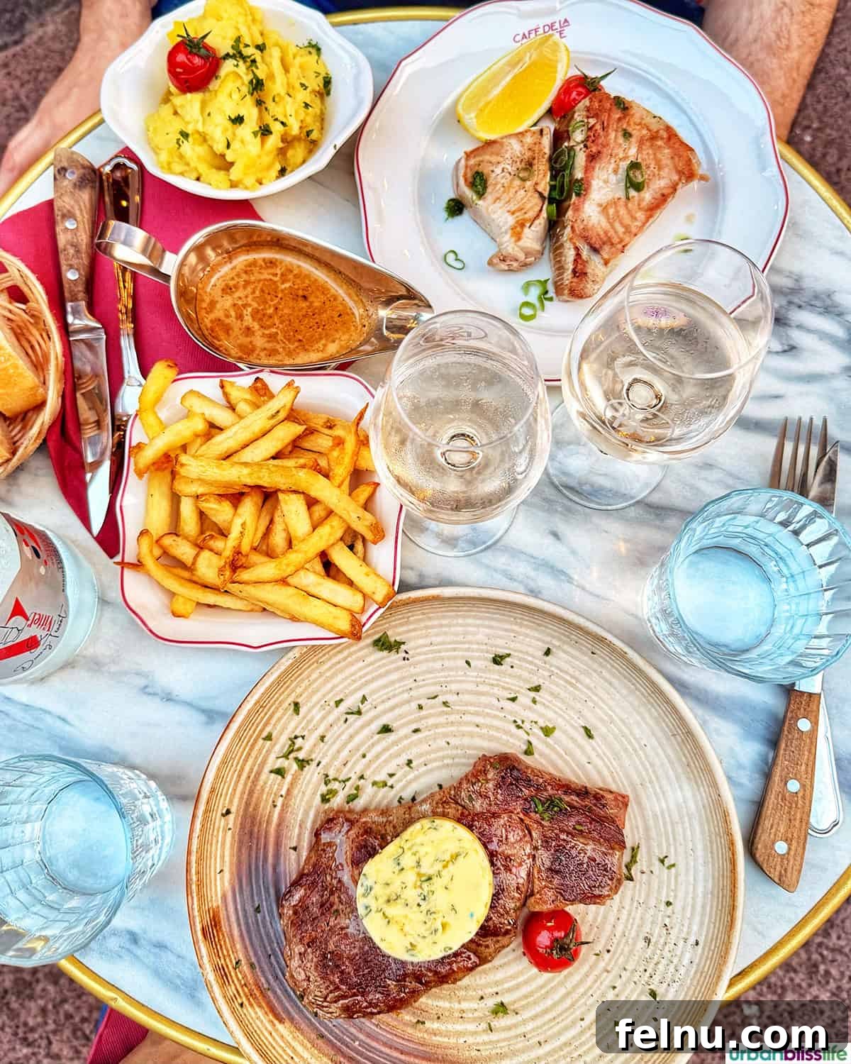 Montpellier's Gastronomic Guide: Where to Indulge in French Flavors 12 A delightful duo of entrecote and tuna steak, served with crispy fries, at Cafe de la Mairie.