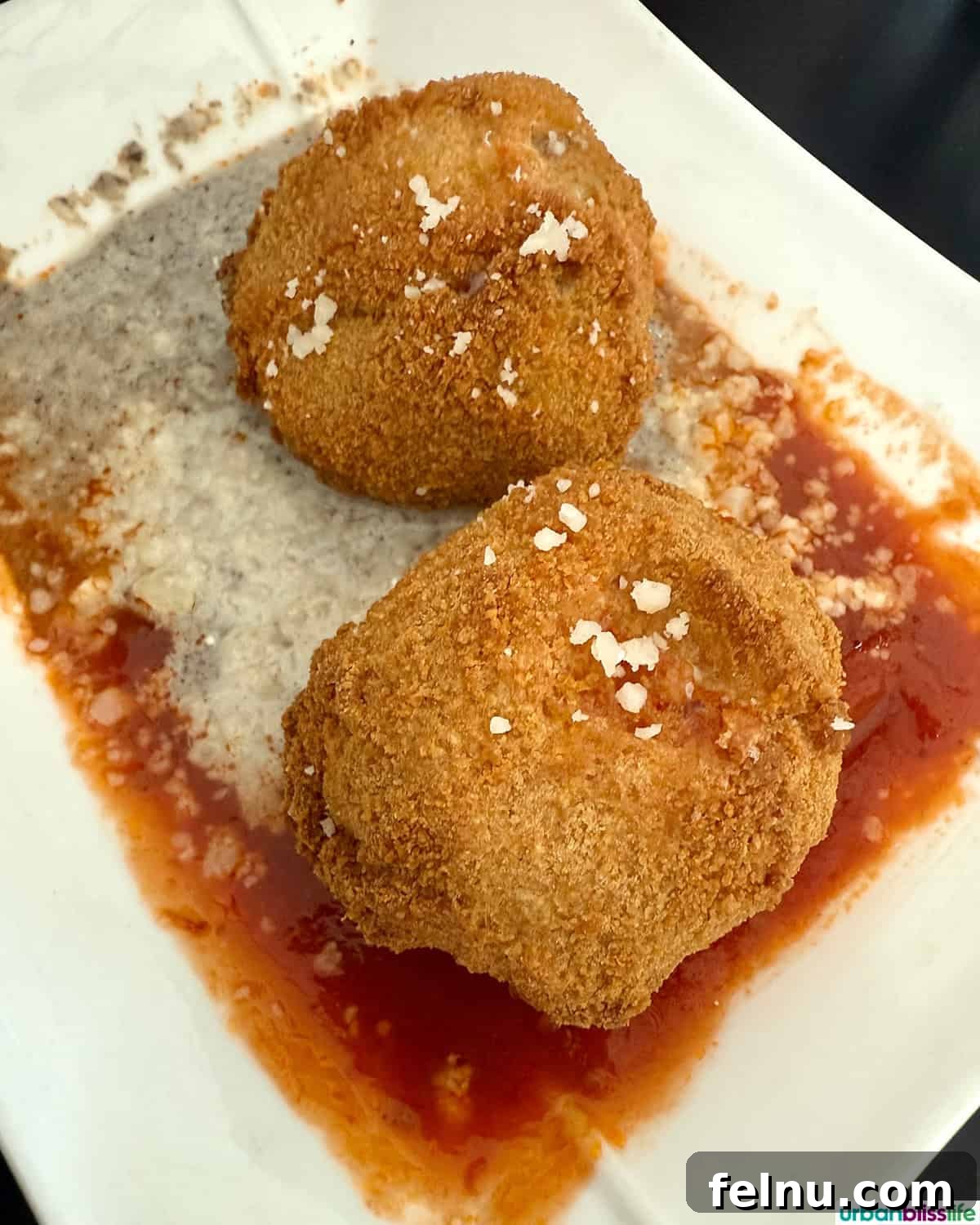 Montpellier's Gastronomic Guide: Where to Indulge in French Flavors 14 Golden-fried arancini, crispy on the outside and creamy on the inside, at Casa di Giorgio.