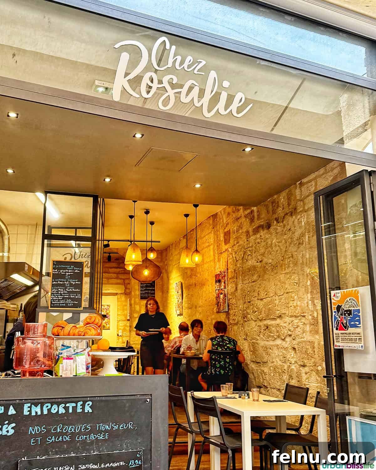 Montpellier's Gastronomic Guide: Where to Indulge in French Flavors 17 The charming street view of Chez Rosalie, a quaint bistro in Montpellier, France.