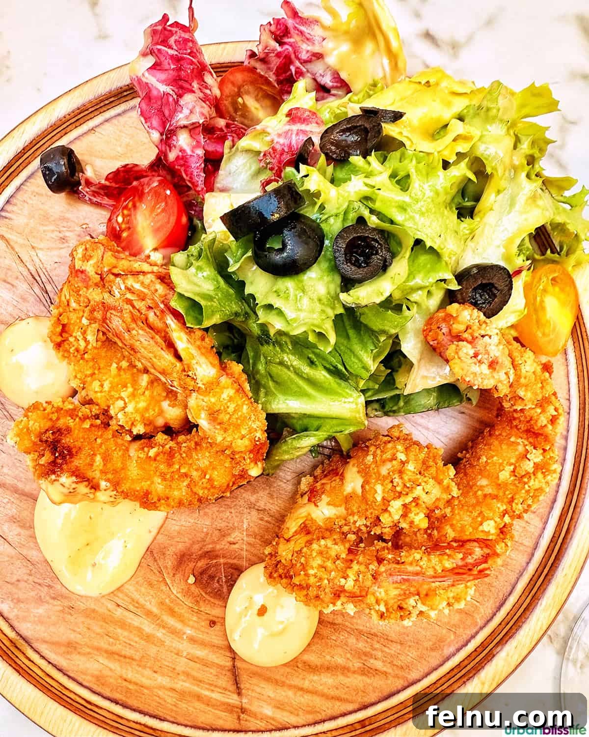 Montpellier's Gastronomic Guide: Where to Indulge in French Flavors 21 Crispy panko prawns, a delightful appetizer at Pinocchio Restaurant in Montpellier.