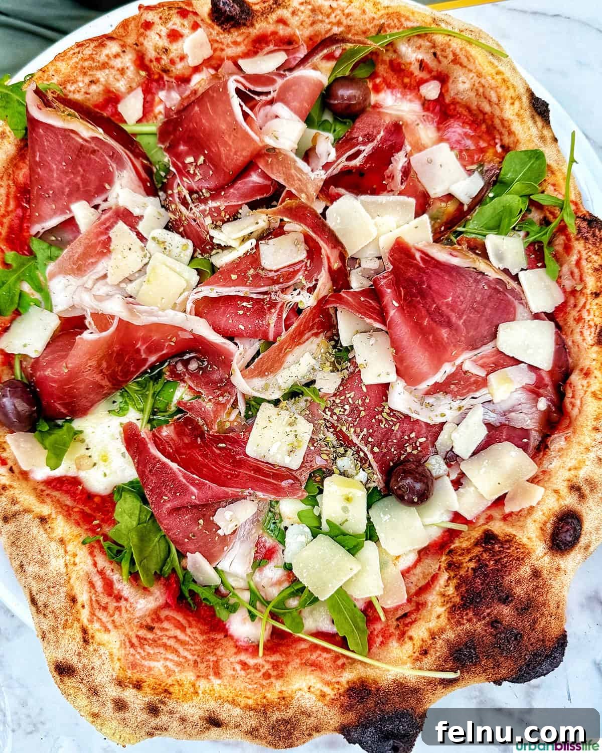 Montpellier's Gastronomic Guide: Where to Indulge in French Flavors 22 The delicious Pizza di Parma, topped with prosciutto, at Pinocchio Restaurant.