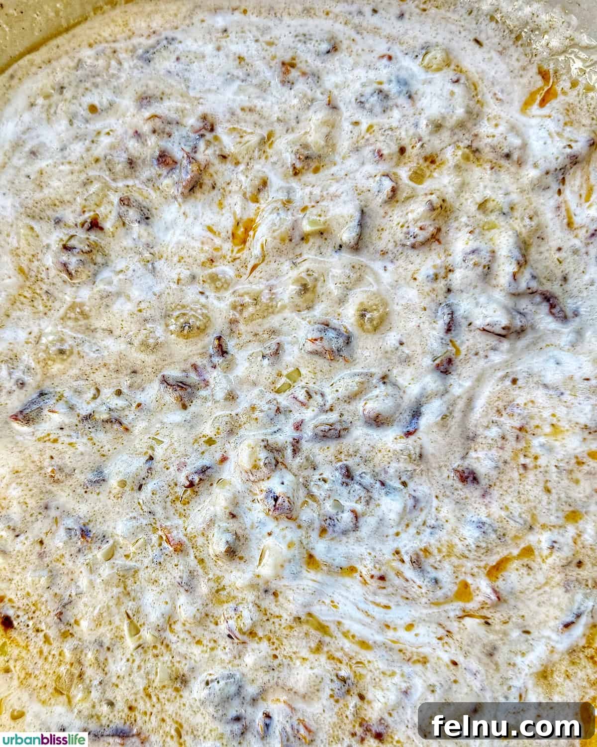 Tuscan Sausage Pasta Delight 14 Tuscan sausage pasta sauce in a pan