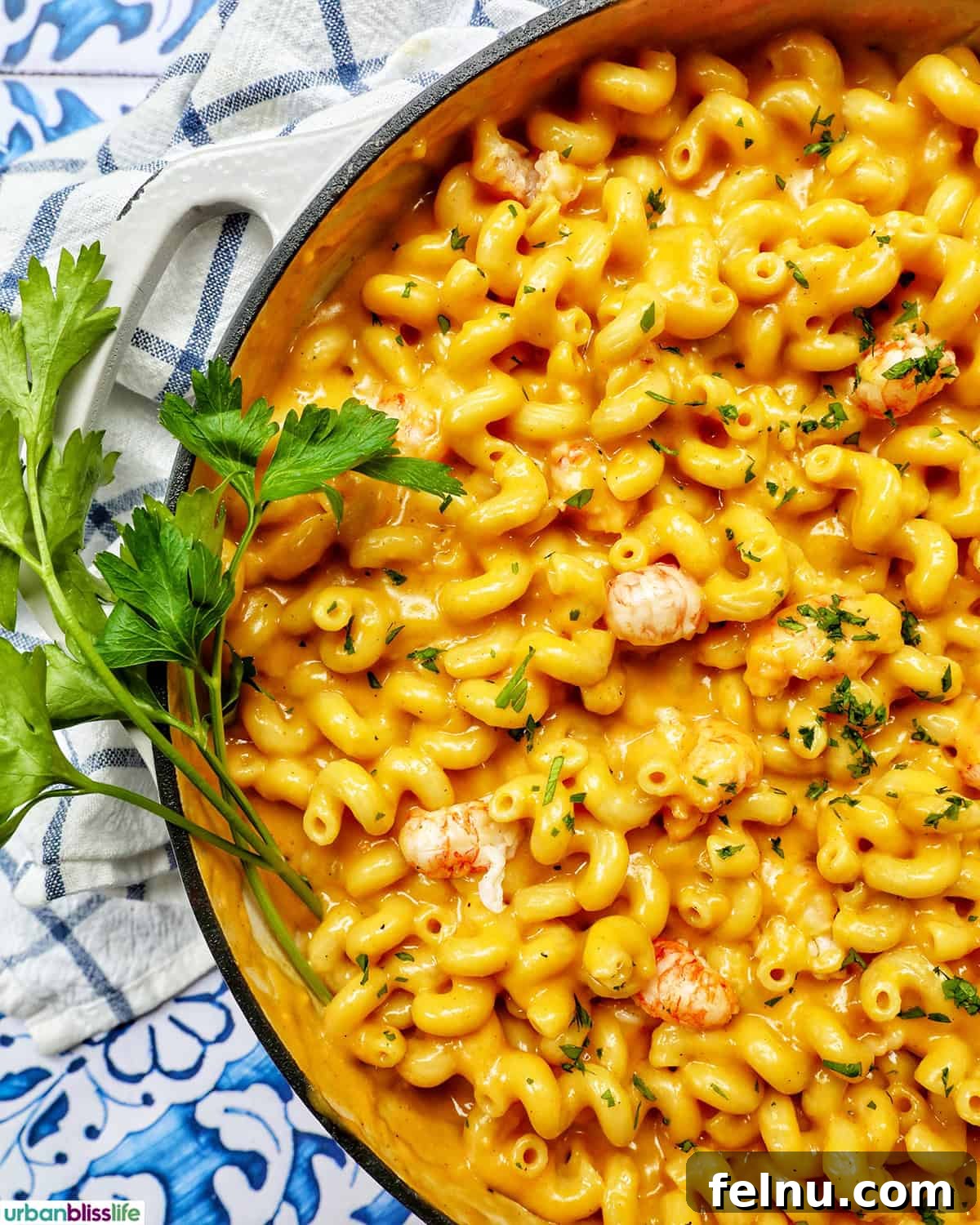 A glorious pan of creamy lobster mac and cheese, ready to be served, showcasing its golden crust and succulent lobster pieces.