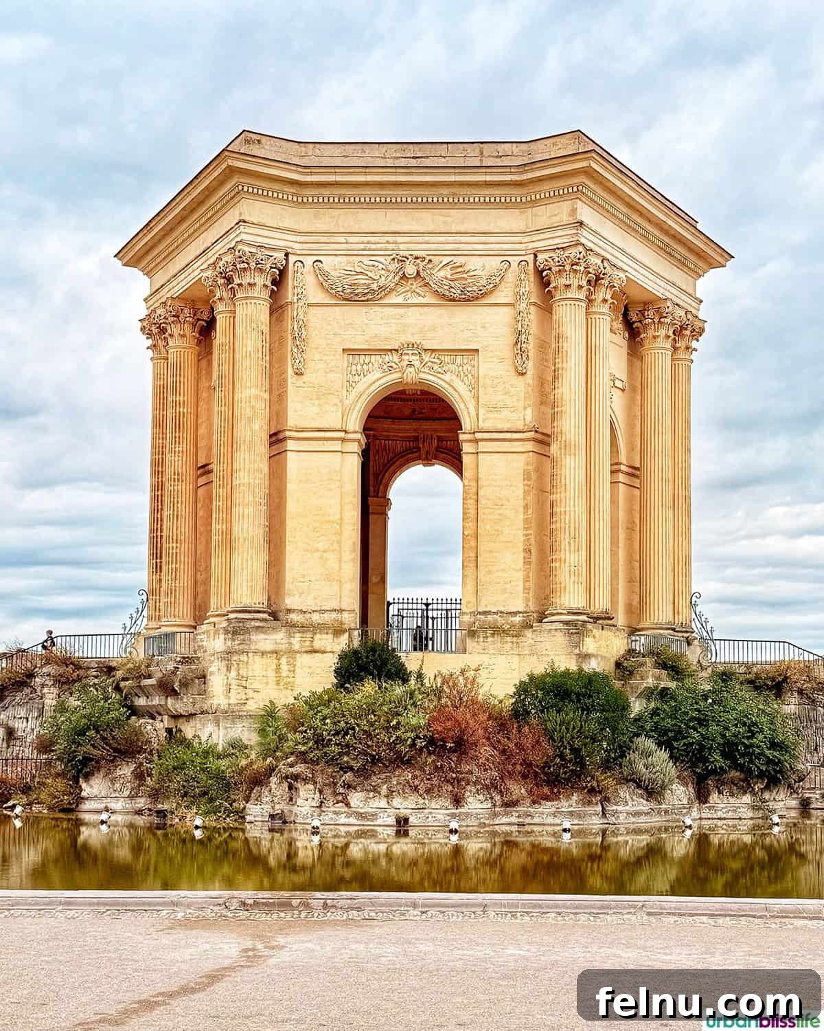 Montpellier Magic: Your Guide to a French Gem 9 Historic water tower at Place du Peyrou in Montpellier, overlooking the aqueduct.