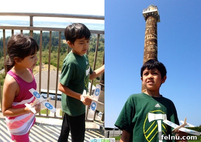 Astoria Uncovered: Exploring Oregon's Historic River Mouth 13 Child launching a biplane from Astoria Column