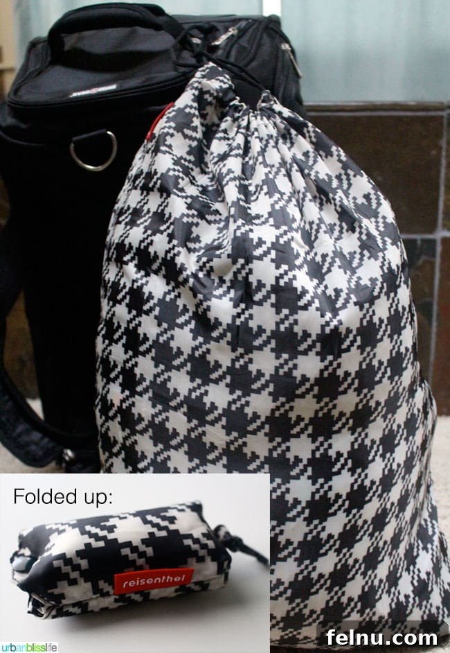 Effortless Packing for Extended Adventures 11 Extended stay travel essential: a cute, collapsible houndstooth laundry bag.