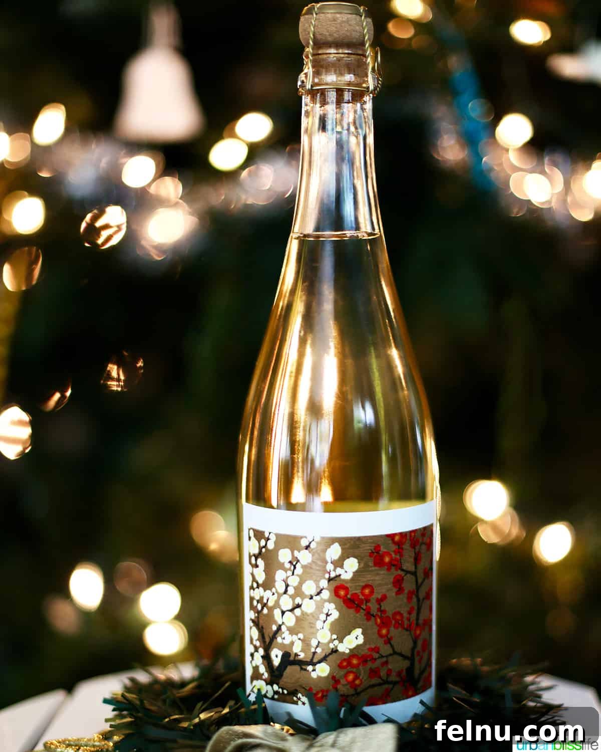 Celebrate with the Perfect New Year's Eve Wines 3 glass of sparkling wine with twinkling lights on