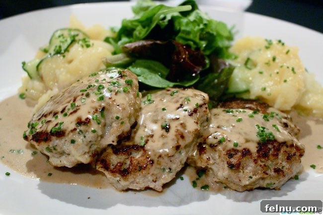 Gustavs House 6 Pan-seared housemade veal and pork meatballs with pepper cream sauce and Bavarian potato salad at Gustav's