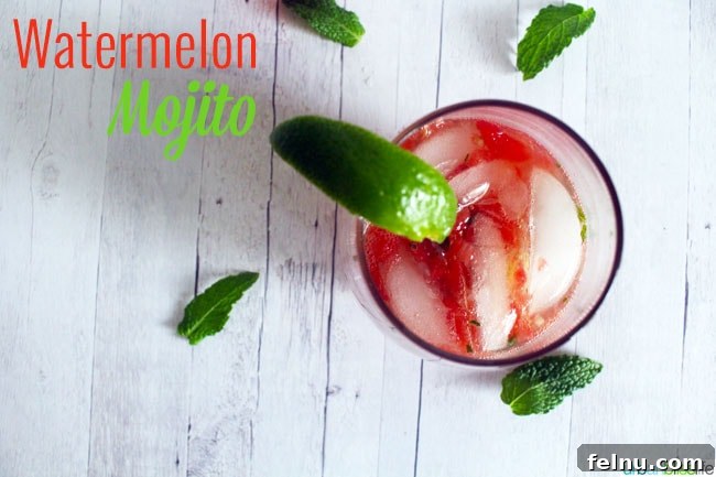 Crimson Crush Mojito 5 A pitcher of Watermelon Mojitos ready for a party, garnished with fresh mint and lime.
