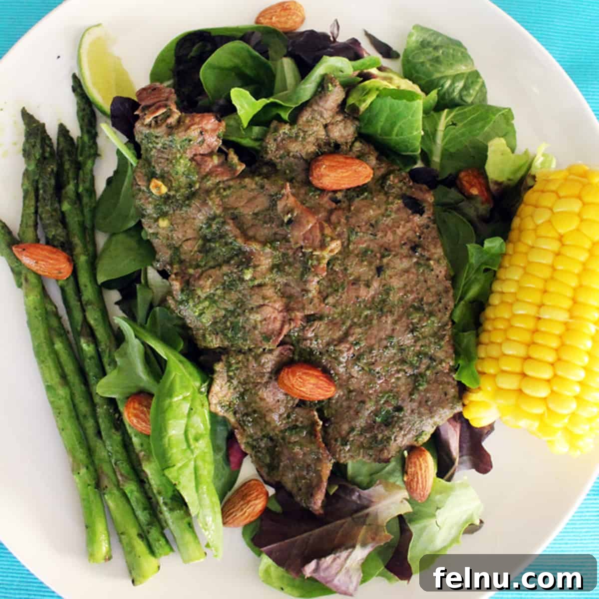 Grilled Steak with Basil Pesto 2 Grilled steak with cilantro almond pesto and corn