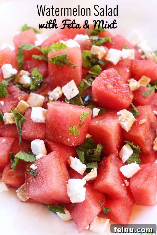Close-up of a vibrant watermelon salad with feta and mint, a perfect summer side dish