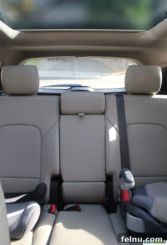 2015 Hyundai Santa Fe Sport: What You Need to Know 5 Luxurious beige leather interior of the 2015 Hyundai Santa Fe Sport with ample legroom