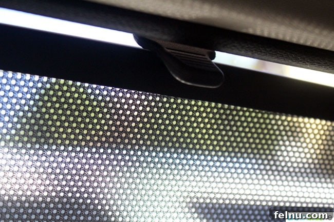 2015 Hyundai Santa Fe Sport: What You Need to Know 7 Convenient manual rear side window sun shade in the 2015 Hyundai Santa Fe Sport