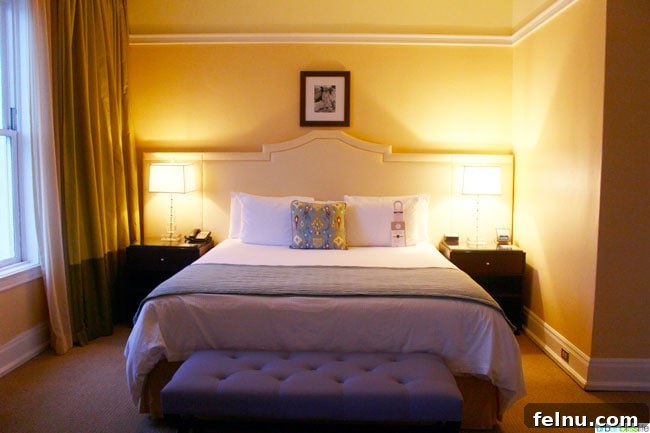 Portland's Indie Stays: Boutique Hotels with Personality 14 Cool Hotels in Portland, Oregon: Hotel deLuxe stylish bedroom with plush bedding and vintage accents