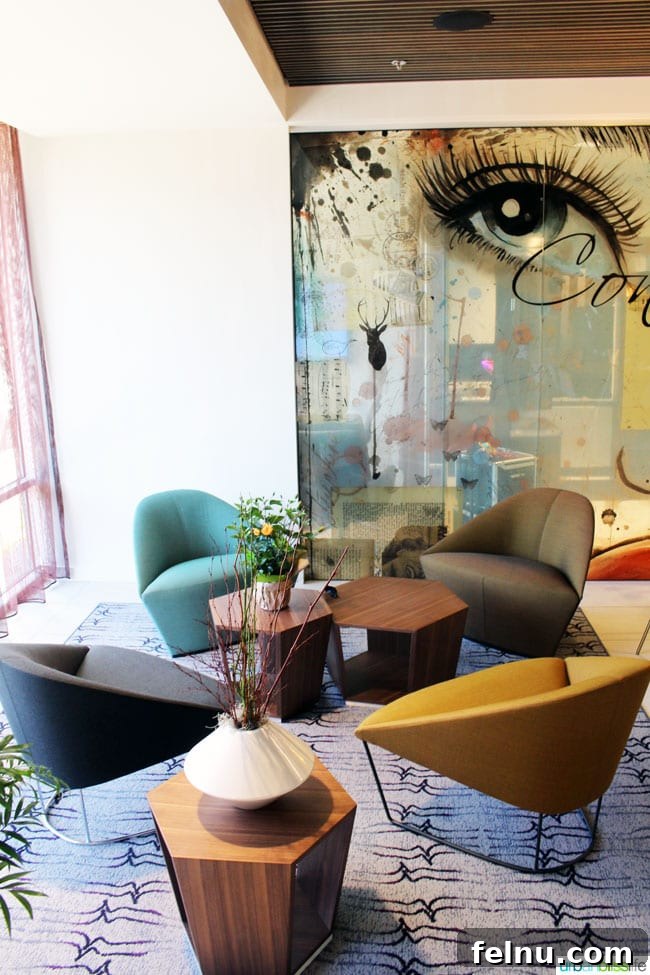 Portland's Indie Stays: Boutique Hotels with Personality 3 Cool Hotels in Portland, Oregon: Hotel Eastlund lobby showcasing modern design and vibrant art