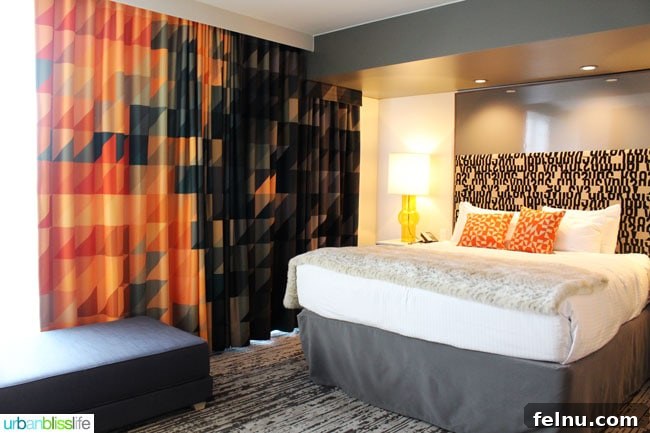 Portland's Indie Stays: Boutique Hotels with Personality 4 Cool Hotels in Portland, Oregon: Hotel Eastlund guest room with comfortable bed and stylish decor