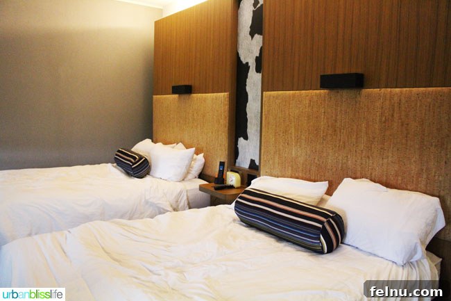 Portland's Indie Stays: Boutique Hotels with Personality 9 Where to Stay in Portland, Oregon: ALoft Hotel beds with unique headboards and bright accents