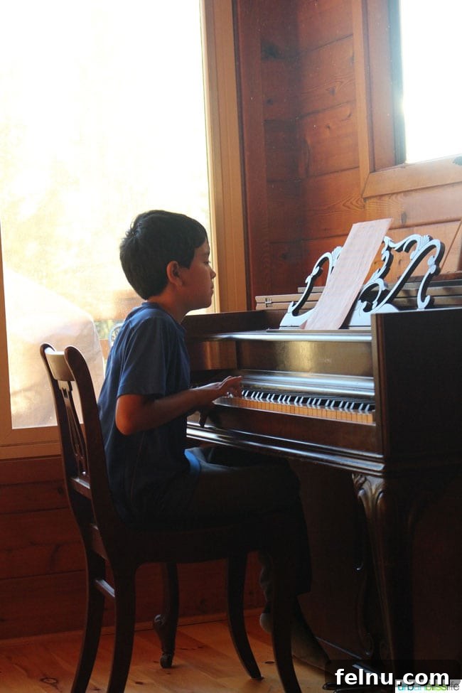 Oregon Shores Glamorous Getaway 11 kid playing piano