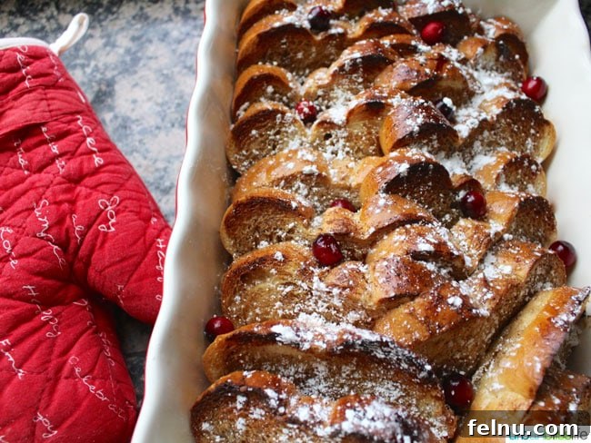 Overnight Brioche French Toast Bake 3 Oven mitt and freshly baked French Toast