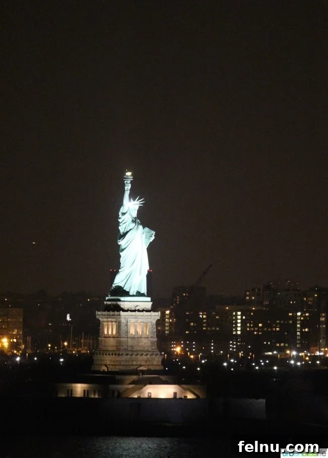 Anthem of the Seas Entertainment Extravaganza 4 Anthem of the Seas sailing majestically past the iconic Statue of Liberty, a symbolic start to a grand journey.