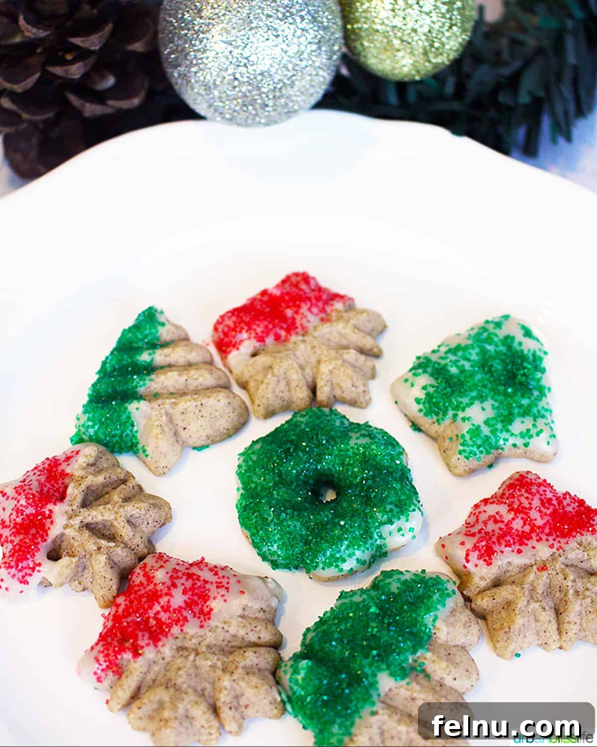 Cinnamon Swirl Delights 11 Red and green Cinnamon Christmas Spritz Cookies on a plate