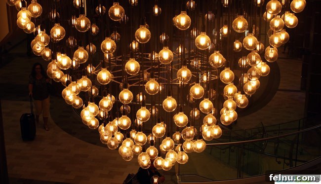 Family Fun Aboard Anthem of the Seas 17 Pulse Spiral Chandelier, an interactive art piece on Anthem of the Seas