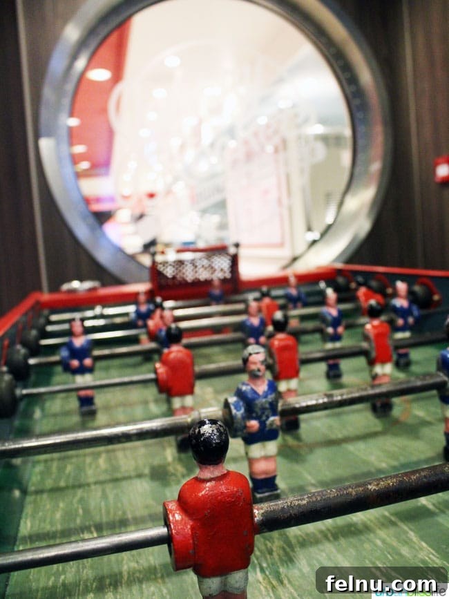 Family Fun Aboard Anthem of the Seas 7 Foosball table in SeaPlex on Anthem of the Seas