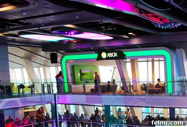 Family Fun Aboard Anthem of the Seas 8 Teens playing Xbox in SeaPlex on Anthem of the Seas