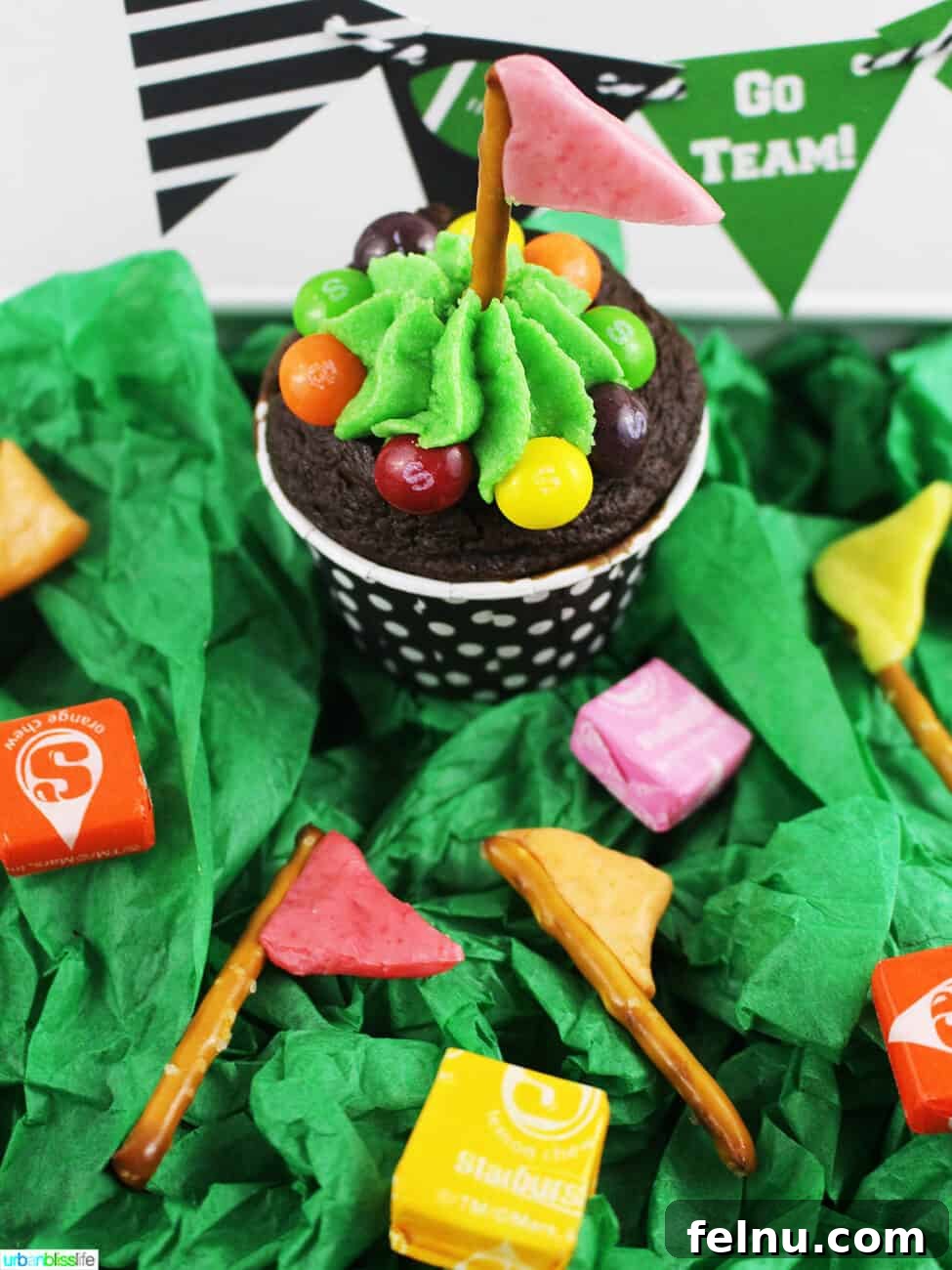 Touchdown Treats: Snickers & Starburst Game Day Delights 2 Game day pretzel flags on cupcake and candy