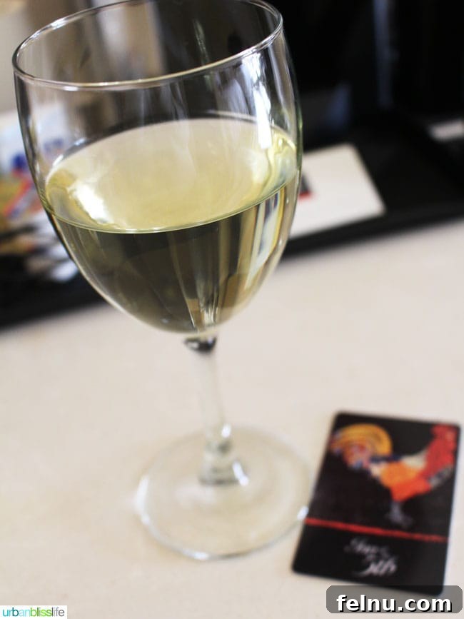 A complimentary glass of wine offered to guests upon arrival at the Inn at the 5th.