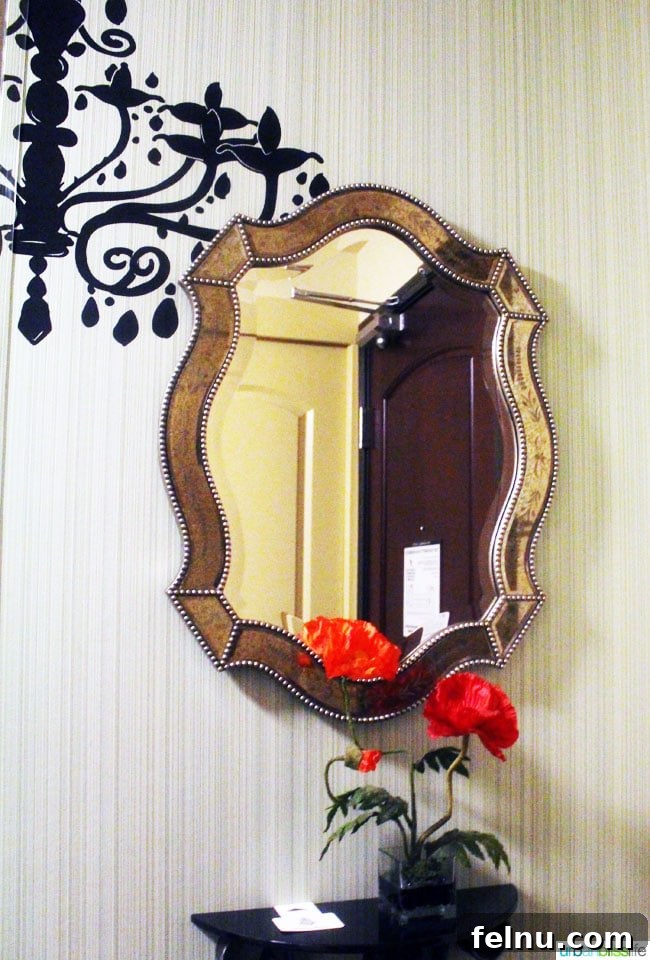 A mirror and decorative accents in a guest room at The Maxwell Hotel Seattle, showcasing the hotel's unique design.