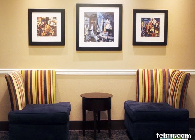 A colorful hallway at The Maxwell Hotel Seattle, showcasing the hotel's vibrant and artistic design.