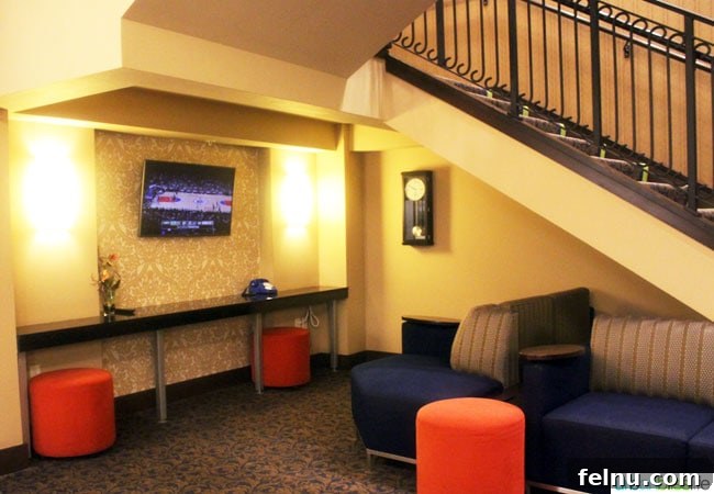 A comfortable seating area with unique artwork at The Maxwell Hotel Seattle.