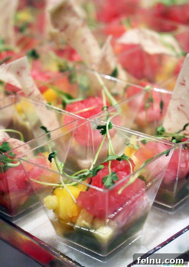 Seattle Wine and Food Experience: POP! Bubbles and Seafood 7 Tuna Poke with Mango, Pineapple, Wasabi Pudding, Avocado, and Lime, a visually stunning dish at the POP! event.