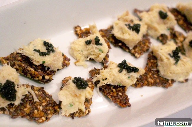 Seattle Wine and Food Experience: POP! Bubbles and Seafood 8 Salted Cod with Paddlefish Caviar and Sesame Crisp, an inventive dish at the Seattle Wine and Food Experience.