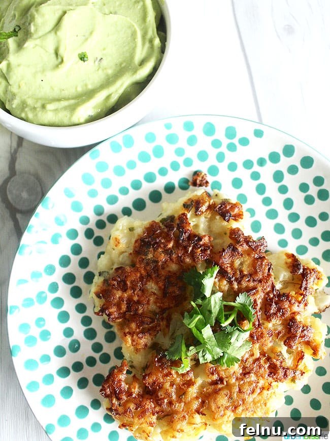Cauliflower Fritters with Dairy-Free Avocado Aioli recipe on UrbanBlissLife.com