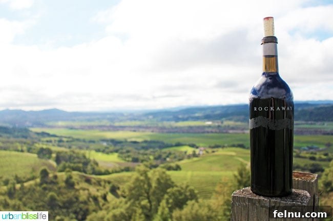 Rodney Strong Vineyards Your Sonoma Wine Escape 16 Bottle of Rockaway wine with stunning green vineyard views in the background