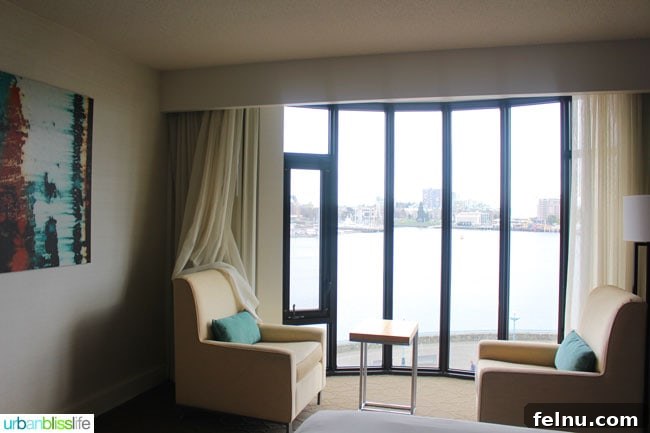 Sitting area in a guest room at the Delta Victoria Ocean Pointe Resort.