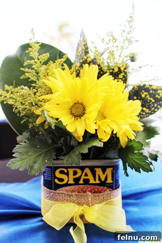Close-up of a classic can of SPAM adorned with tropical flowers, highlighting its cultural significance