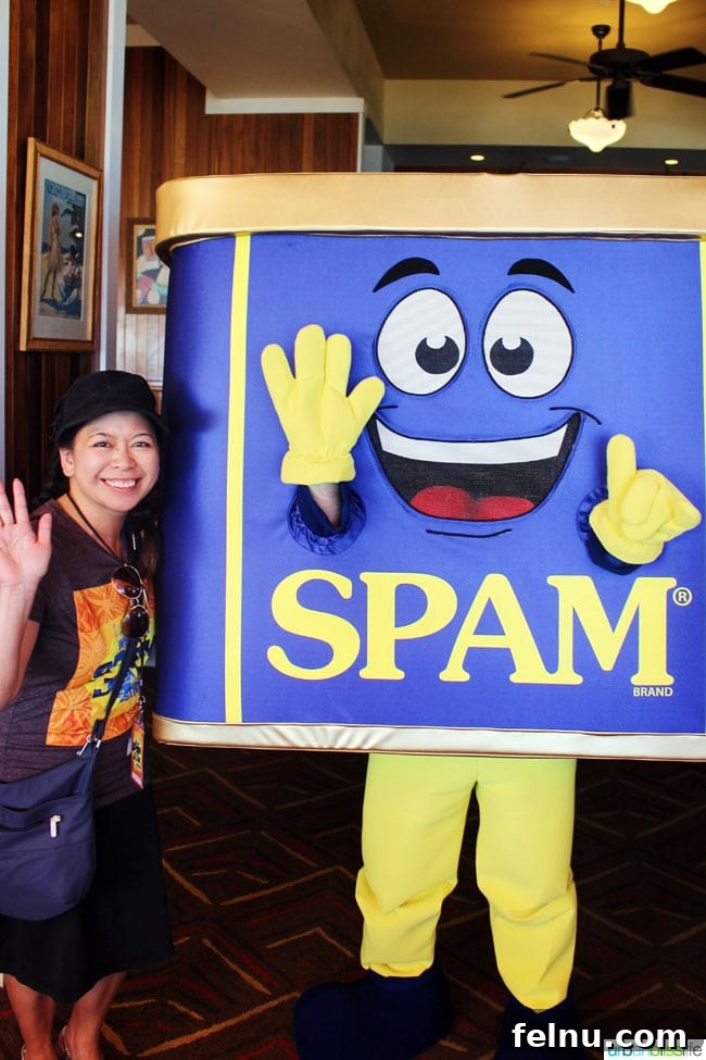 The cheerful SPAM Can mascot posing for photos at the Tweet Up event